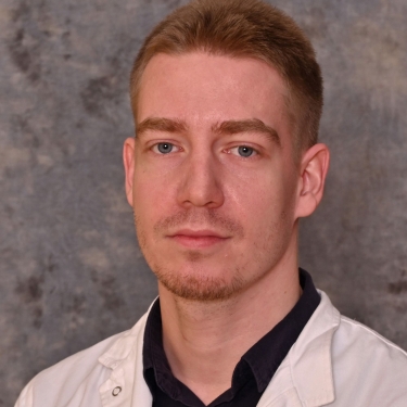 Dr Andor Der